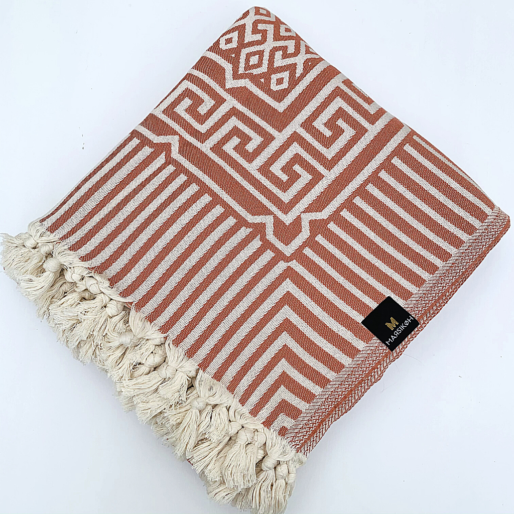 Orange Olympia blanket folded
