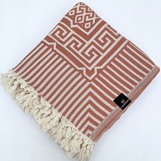 Orange Olympia blanket folded